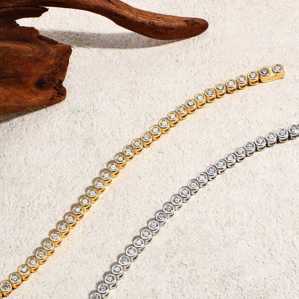 Bee-Bees moissanite tennis bracelets in gold and silver plated 925 sterling silver with round cut stones.