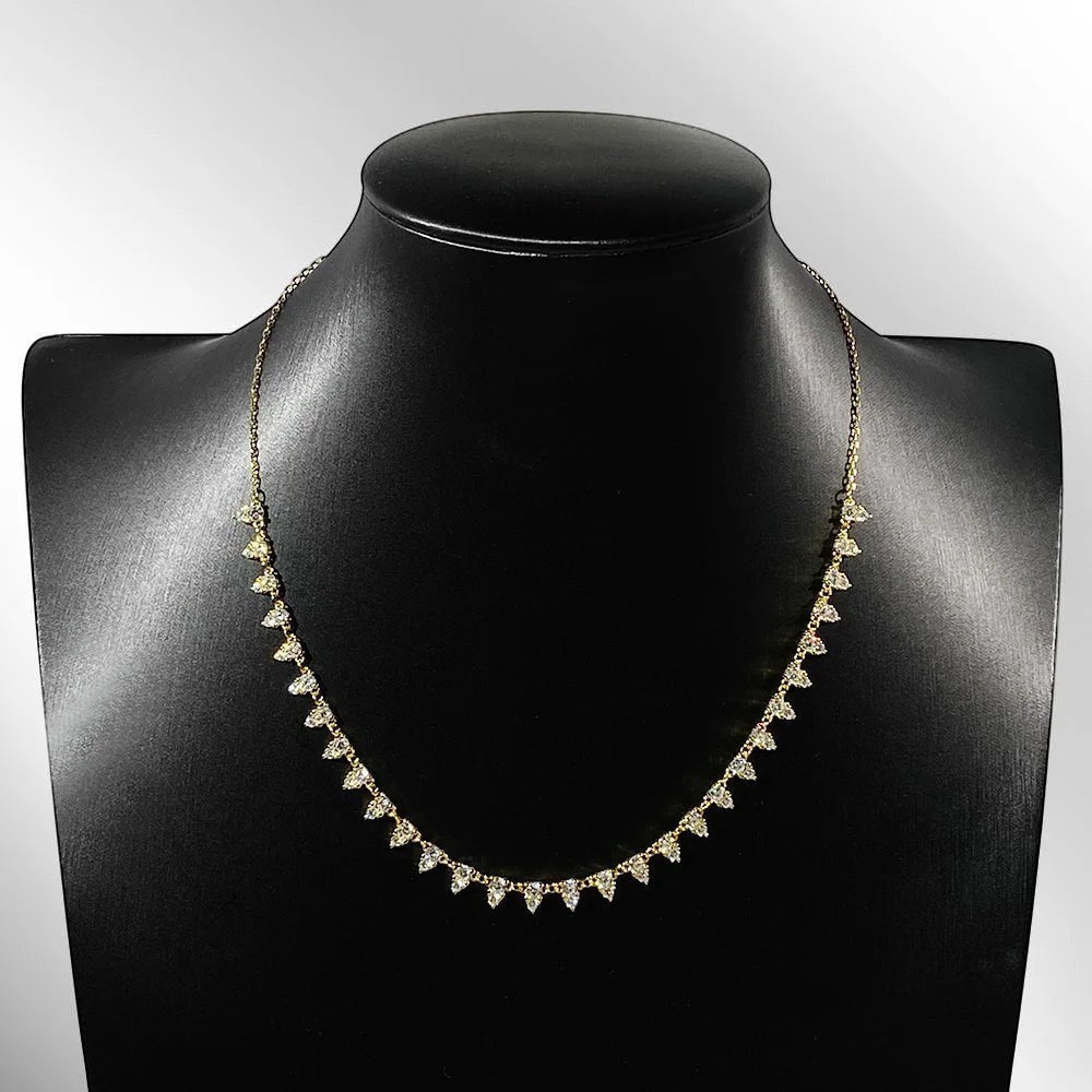 Bee-Bees 18-inch 925 silver tennis necklace with 2mm D color VVS1 moissanite stones in a 3-claw setting.