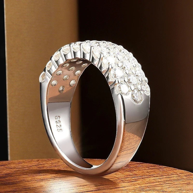 Bee-Bees D Color VVS1 Moissanite triple row half eternity band in S925 sterling silver with 18k white gold plating.