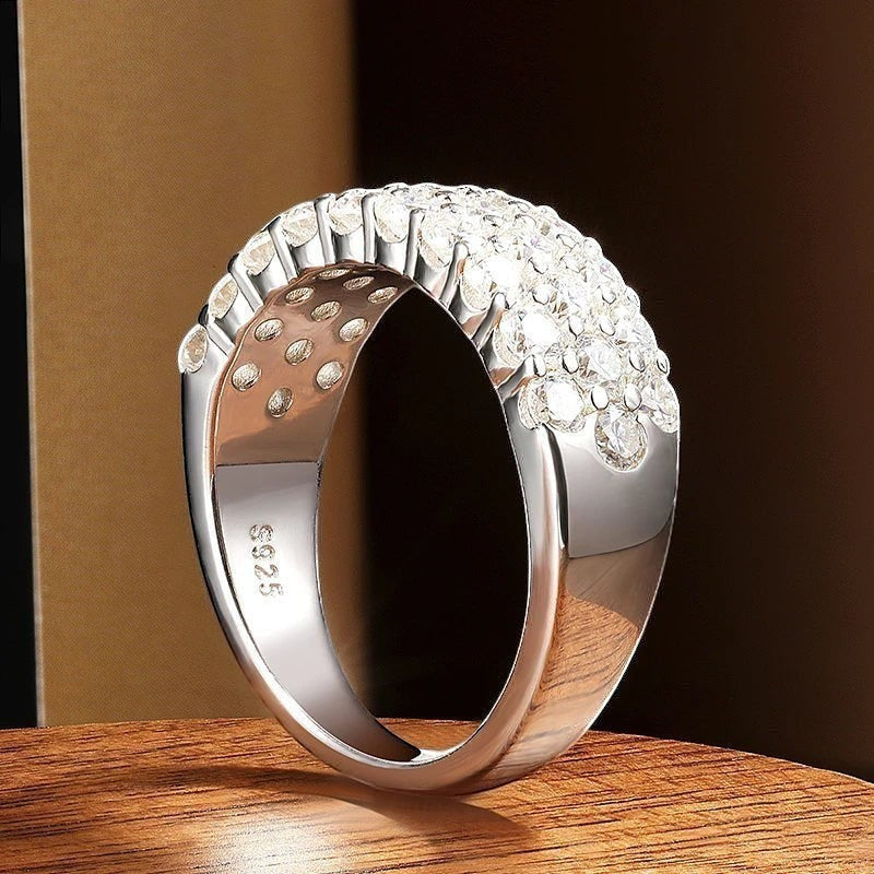 Bee-Bees D Color VVS1 Moissanite triple row half eternity band in S925 sterling silver with 18k white gold plating.