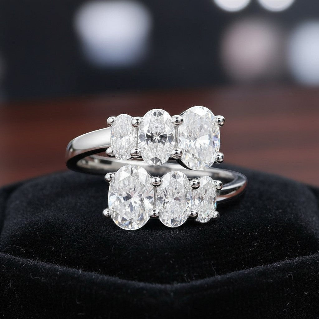 Bee-Bee's 3.6CT oval moissanite engagement ring in sterling silver with 18K white gold plating. Features five oval cut stones.
