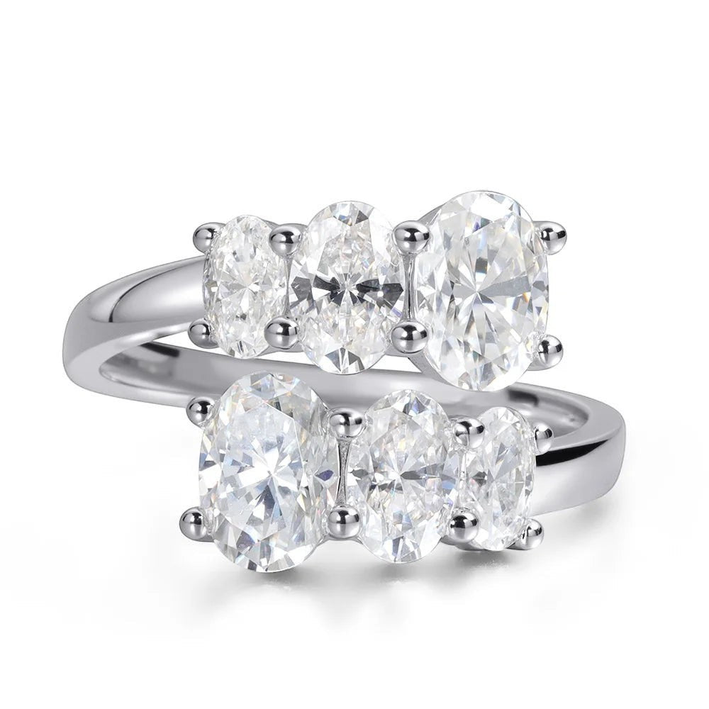 Bee-Bees 3.6CT oval moissanite engagement ring in S925 sterling silver with 18K white gold plating. Features five oval-cut stones.