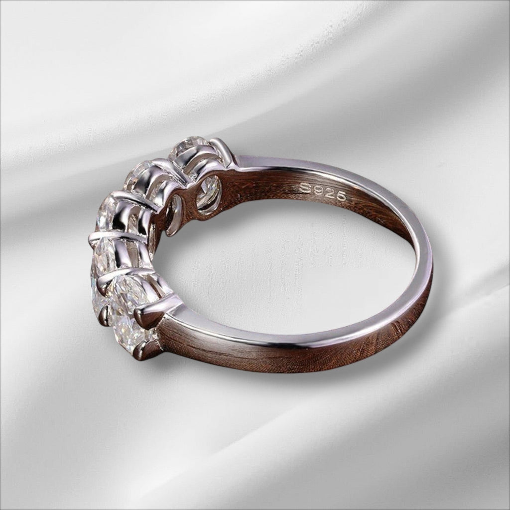 Bee-Bees sterling silver eternity ring with 4*6mm oval D Color VVS1 moissanite stones.