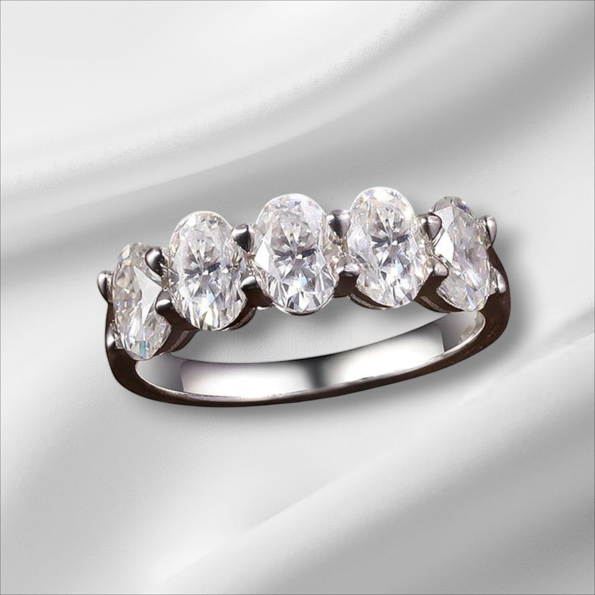 Bee-Bees oval cut moissanite eternity ring with 4*6mm D Color VVS1 stones in sterling silver.