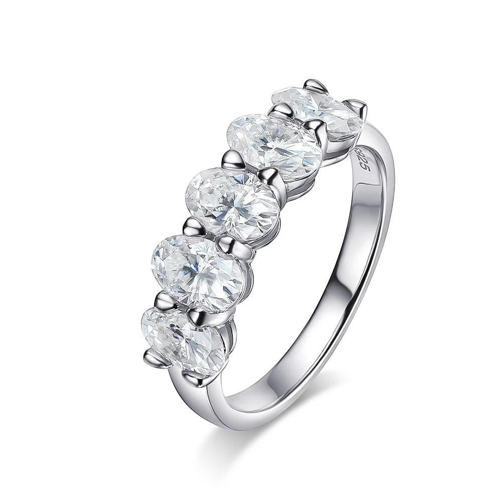 Bee-Bees sterling silver eternity ring with five 4x6mm D Color VVS1 oval cut moissanite stones.