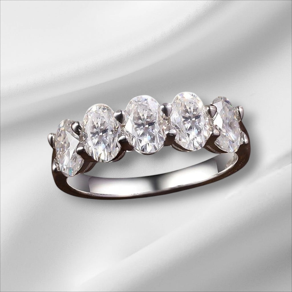 Bee-Bees oval cut moissanite eternity ring with 4*6mm D Color VVS1 stones in sterling silver.
