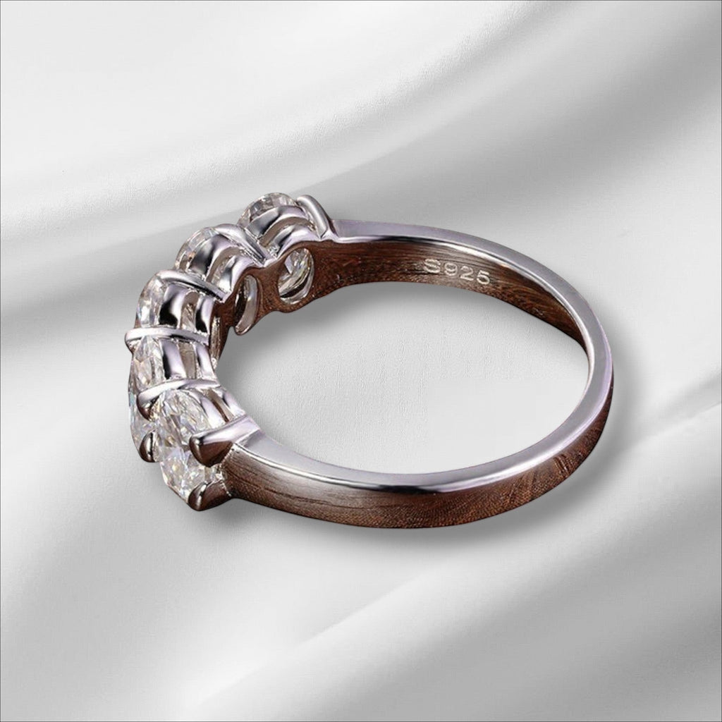 Bee-Bees sterling silver eternity ring with 4*6mm oval D Color VVS1 moissanite stones.