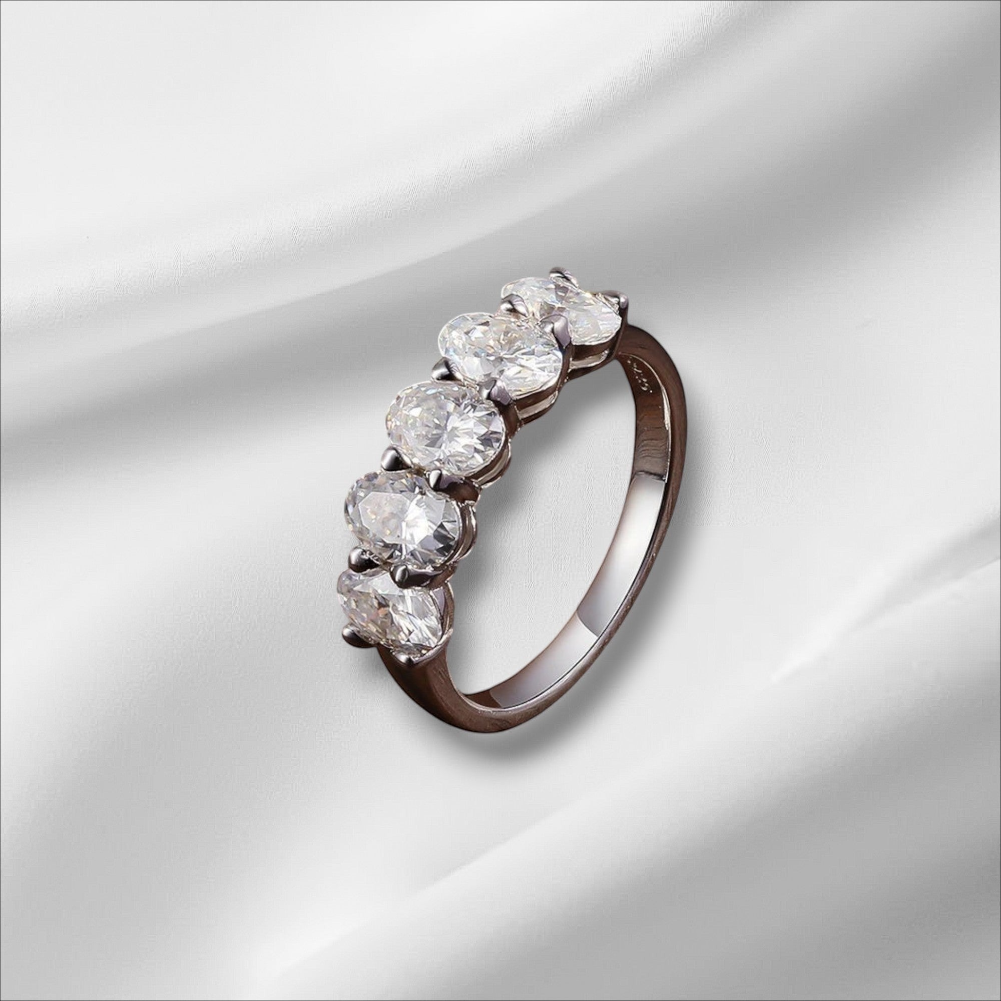 Bee-Bees oval cut moissanite eternity ring with 4*6mm D Color VVS1 stones in sterling silver.