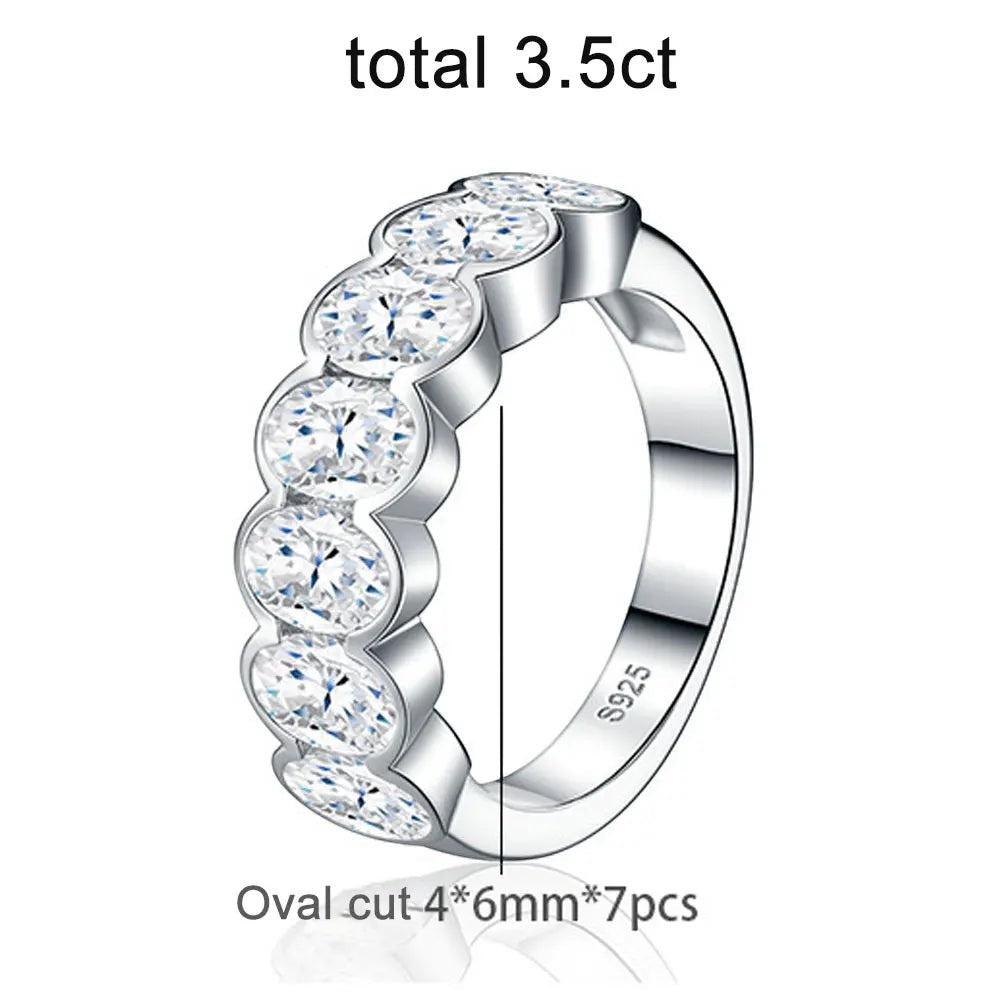 Bee-Bees oval cut moissanite eternity ring in 18k white gold plated sterling silver with shared prong setting