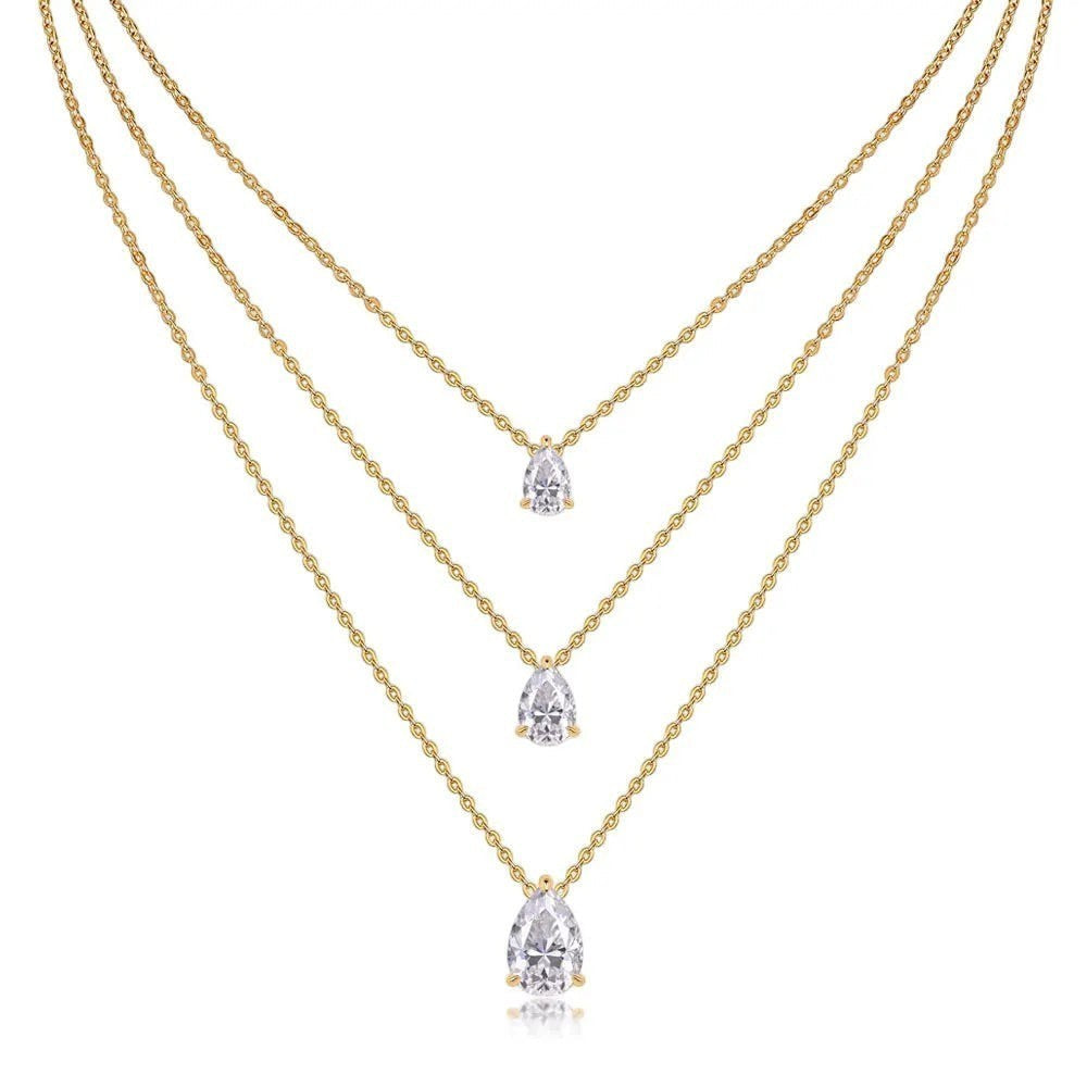 Bee-Bees layered gold necklace with three pear-cut moissanite pendants. D-color, VVS1 clarity.