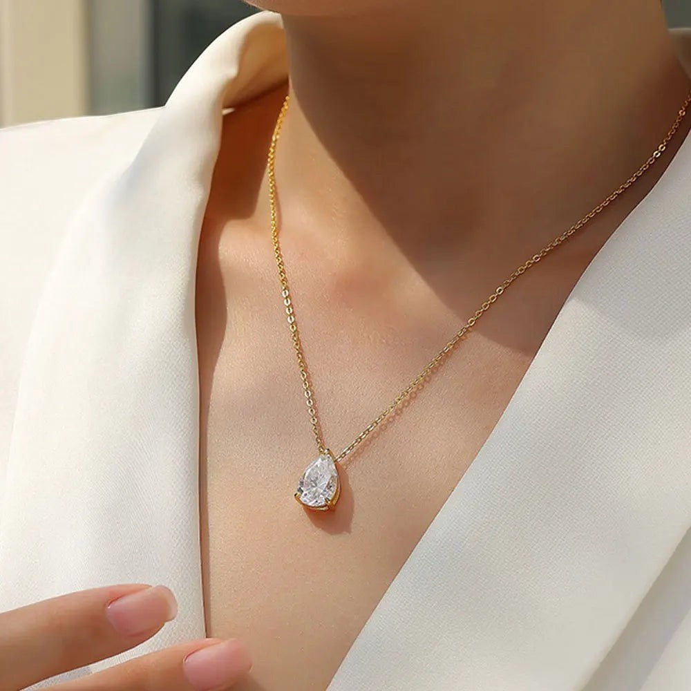 Bee-Bees 1-5ct pear cut moissanite necklace with D color, VVS1 clarity, set in 18k gold plated sterling silver.