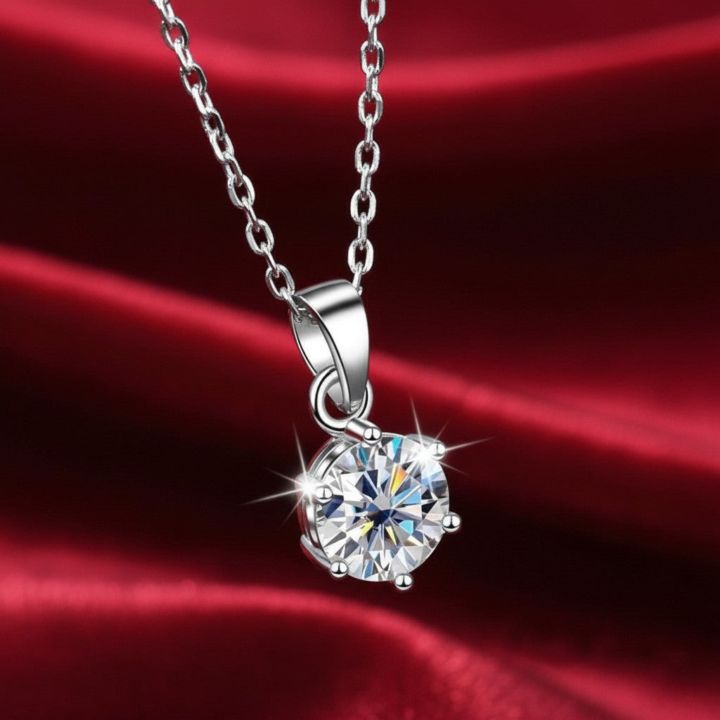 Bee-Bee's classic pear cut moissanite necklace in S925 sterling silver with a brilliant D-color VVS1 clarity stone.