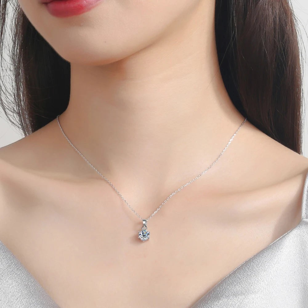 Bee-Bee's classic pear cut moissanite necklace in S925 sterling silver with adjustable chain.