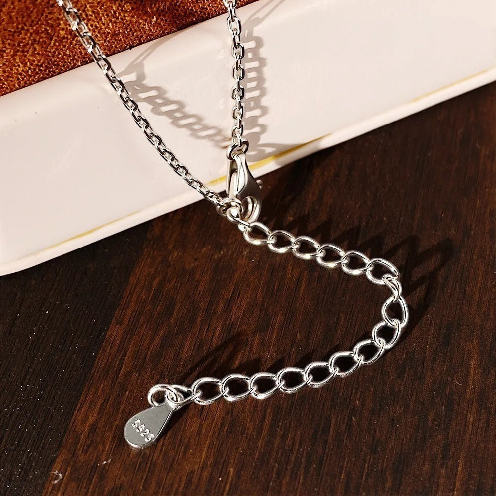Bee-Bee's 7.6ct pear cut moissanite necklace with adjustable sterling silver chain and S925 stamp.