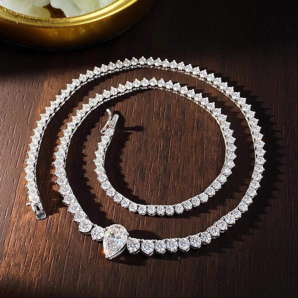 Bee-Bee's Pear cut moissanite tennis necklace with 4ct center stone, D Color VVS1, set in 18K gold plated sterling silver.
