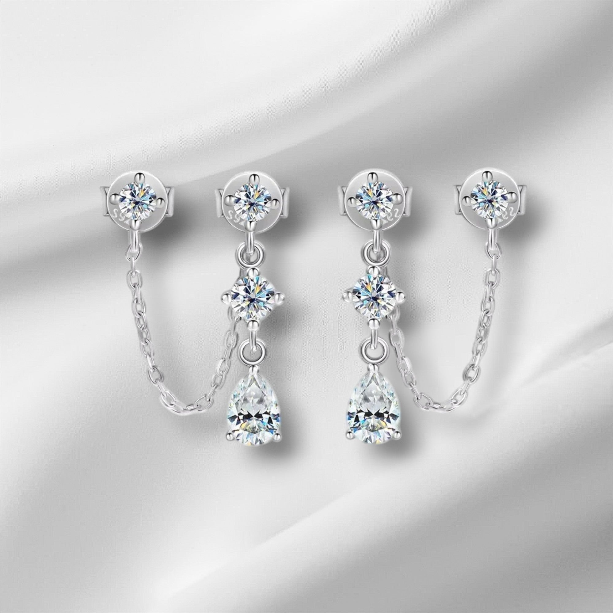 Bee-Bee's D VVS1 pear cut moissanite drop earrings in solid S925 sterling silver with 18k gold plating.