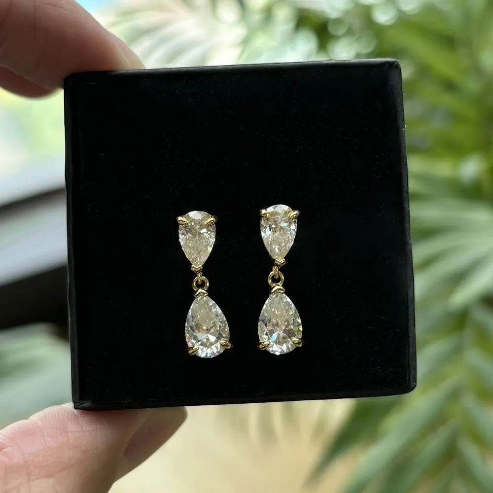 Bee-Bee's D VVS1 pear cut moissanite drop earrings in 18k gold plated S925 sterling silver.