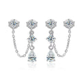 Bee-Bee's sterling silver drop earrings with pear-cut moissanite stones and chain detail. D VVS1 clarity.