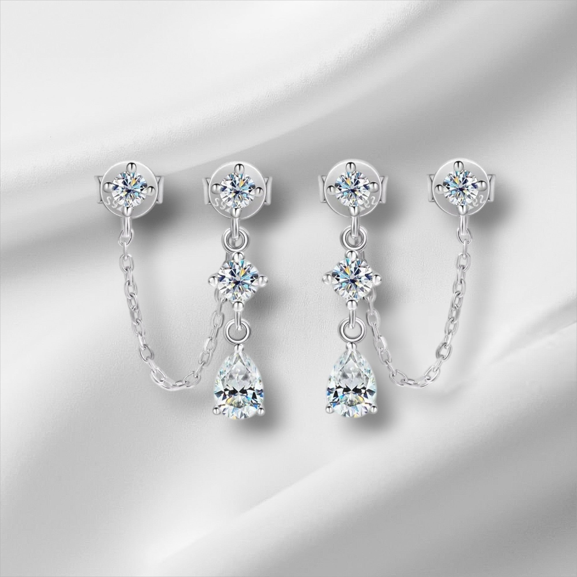 Bee-Bee's D VVS1 pear cut moissanite drop earrings in solid S925 sterling silver with 18k gold plating.