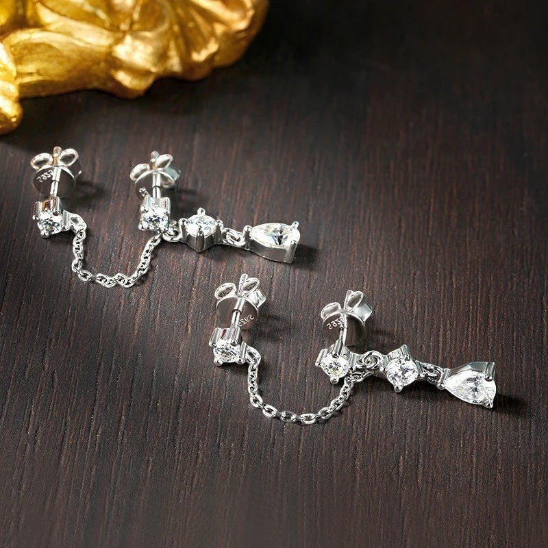Bee-Bee's D VVS1 pear cut moissanite drop earrings in solid S925 sterling silver with 18k gold plating.