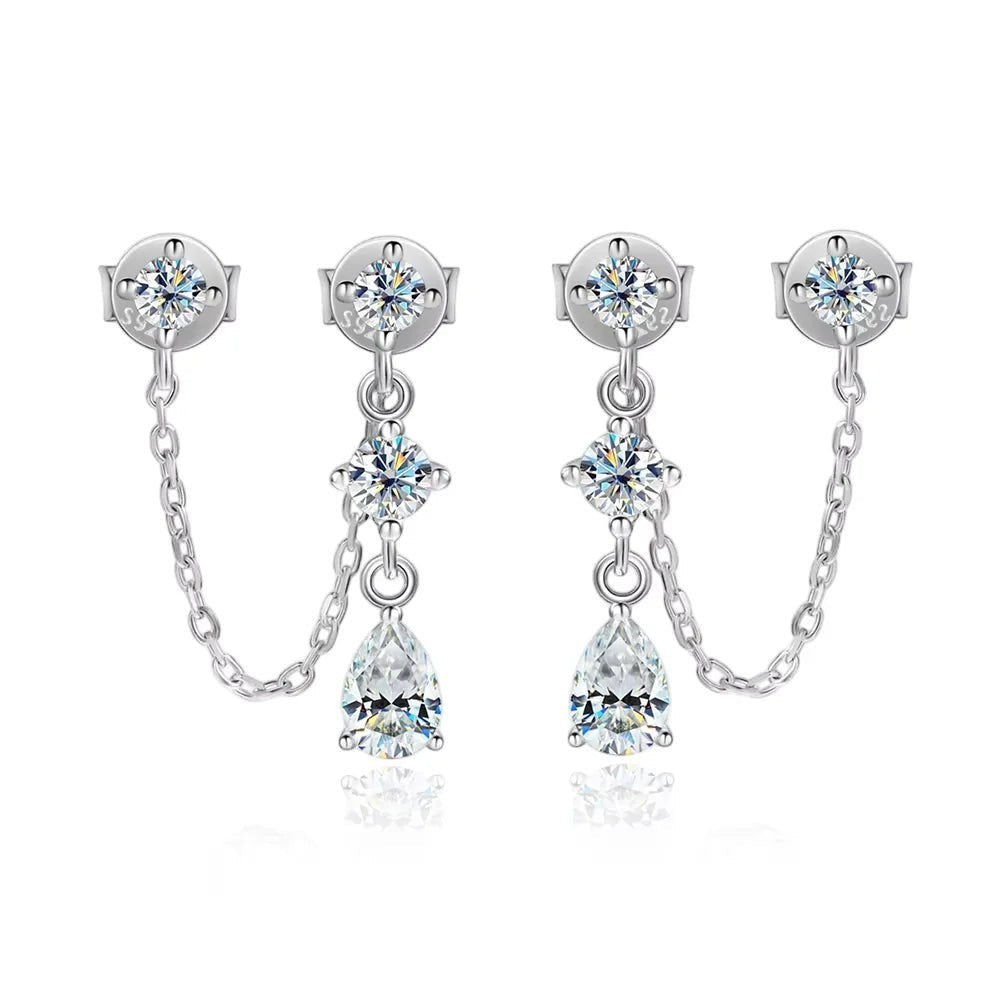 Bee-Bee's sterling silver drop earrings with pear-cut moissanite stones and chain detail.