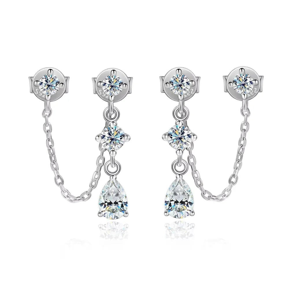 Bee-Bee's sterling silver drop earrings with pear-cut moissanite stones and chain detail.
