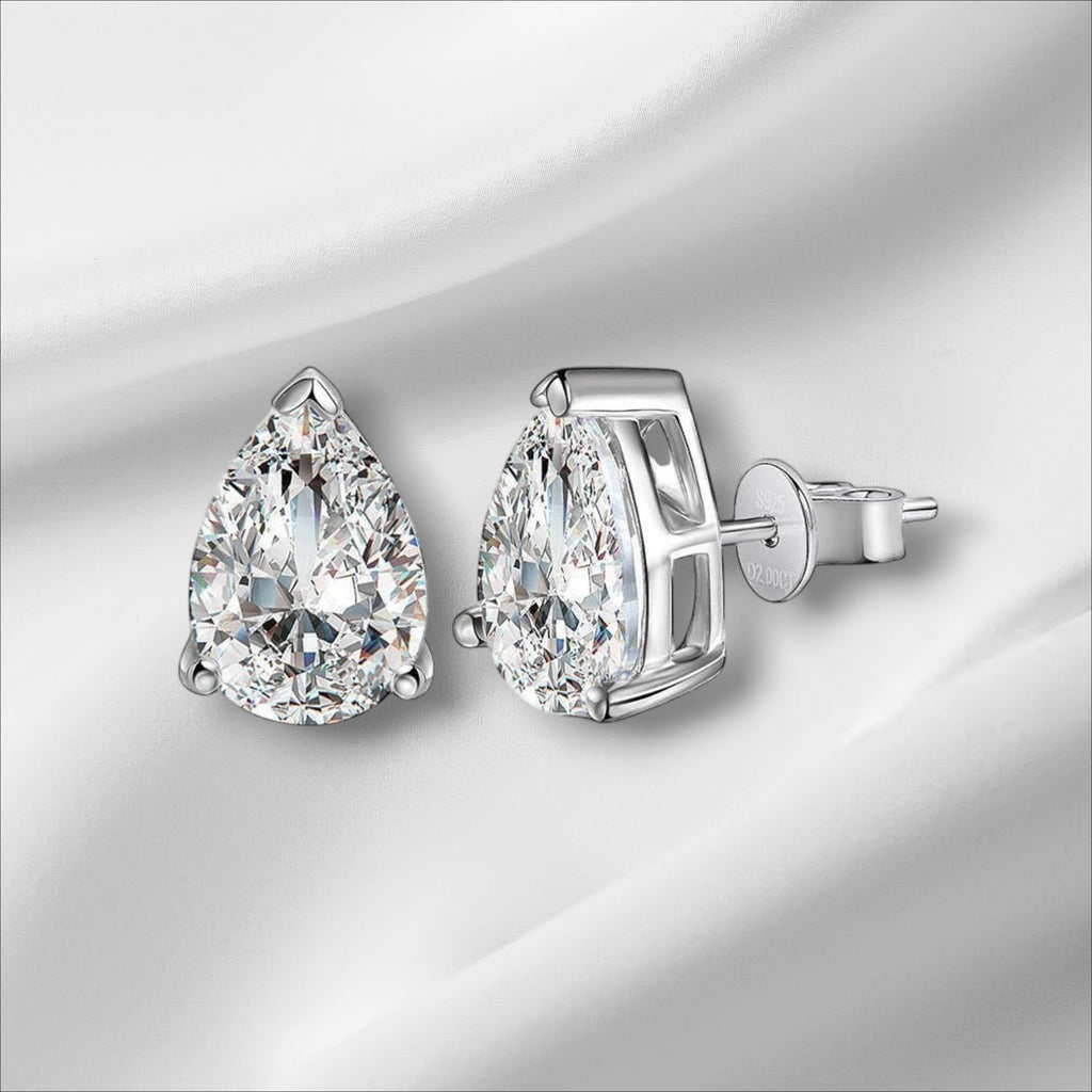 Bee-Bees D Color VVS1 Pear Moissanite Stud Earrings in 925 Sterling Silver with gold finish.