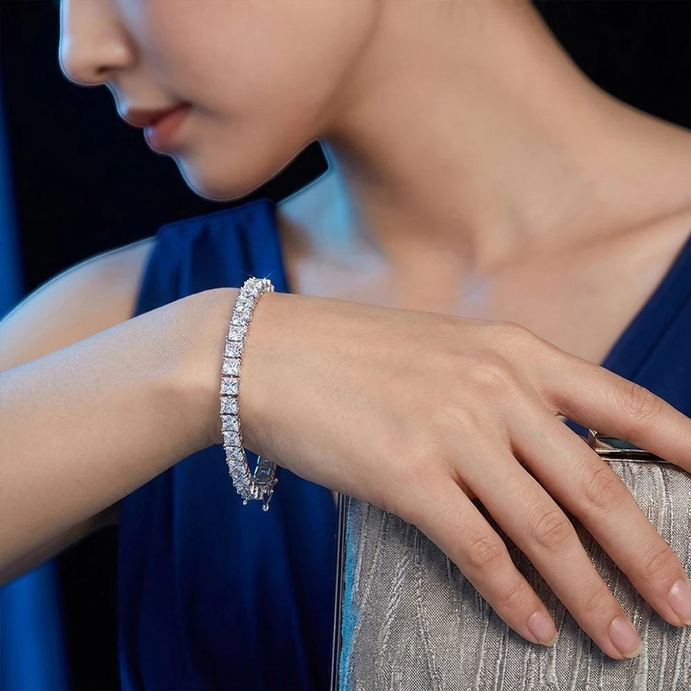 Bee-Bee's Princess cut moissanite tennis bracelet in sterling silver with 18k white gold plating, D color VVS1 clarity.