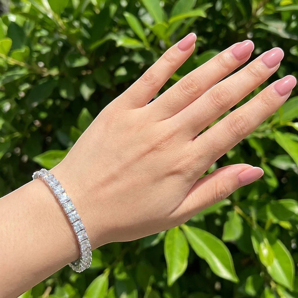 Bee-Bee's bracelet with princess cut VVS1 D color moissanite stones in 18k white gold plated sterling silver.