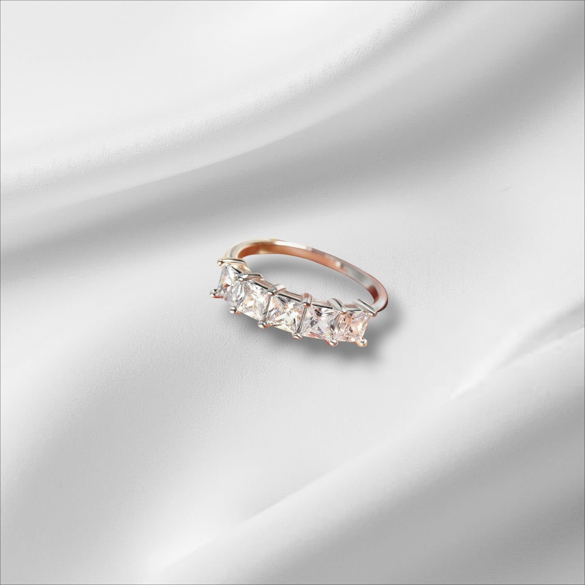 Bee-Bees 18k gold-plated sterling silver wedding band with five princess-cut moissanite stones.