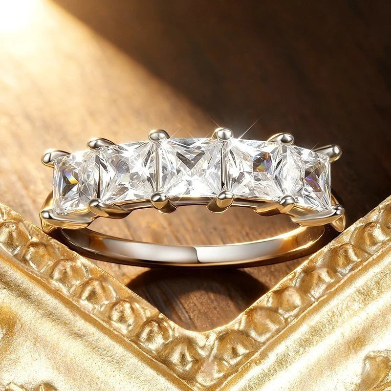 Bee-Bees 18k gold-plated sterling silver band with five princess-cut moissanite stones.