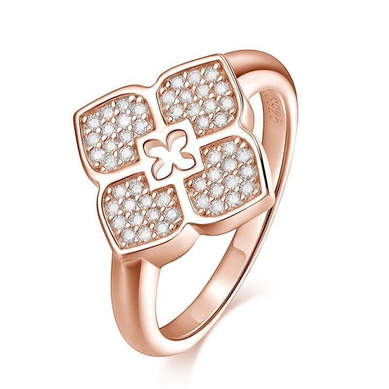 Bee-Bees rose gold four-leaf clover ring with pave moissanite stones and S925 stamp.