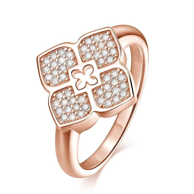 Bee-Bees rose gold four-leaf clover ring with pave moissanite stones and S925 stamp.