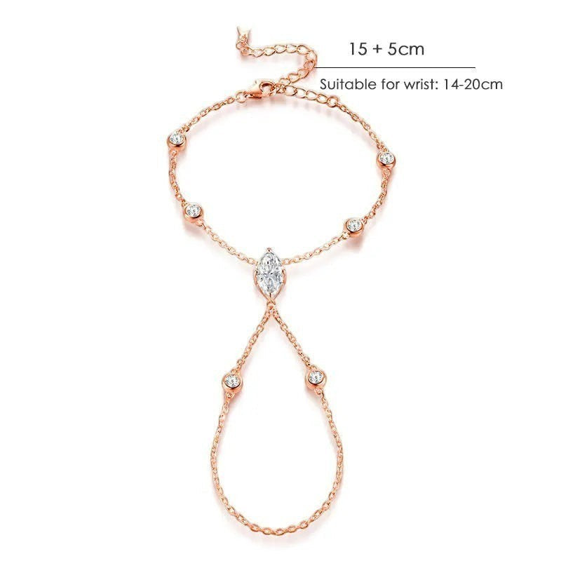 Bee-Bees rose gold s925 sterling silver hand chain bracelet with marquise cut moissanite and bezel-set cubic zirconia.