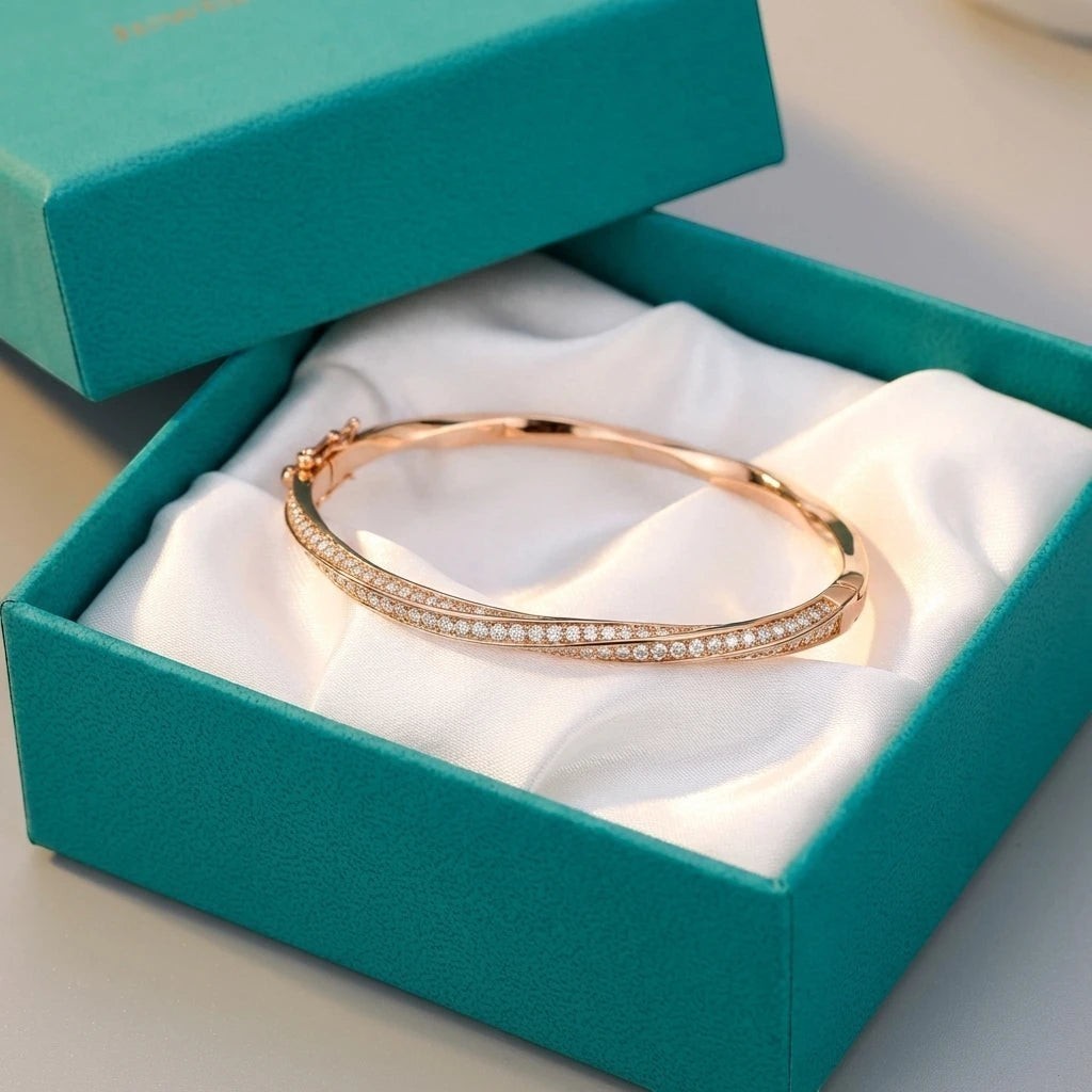 Bee-Bees rose gold twisted bangle bracelet with D VVS1 moissanite stones, set in S925 silver with 18K gold plating.