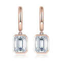 Bee-Bees rose gold plated sterling silver hoop drop earrings with D color emerald cut moissanite stones.