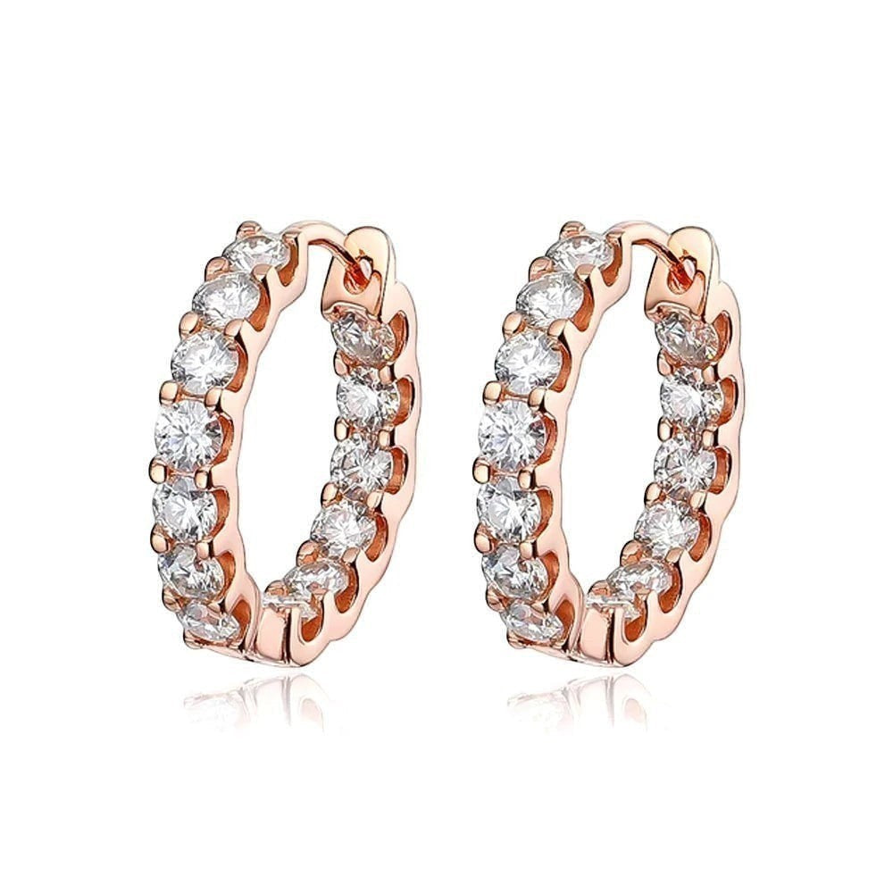 Bee-Bees 2.6ctw rose gold plated sterling silver hoop earrings with round brilliant cut moissanite stones.