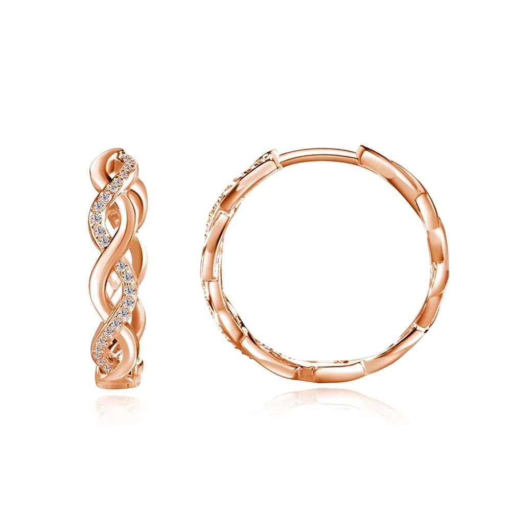 Bee-Bee's rose gold plated sterling silver moissanite hoop earrings with twisted design and pave-set stones.