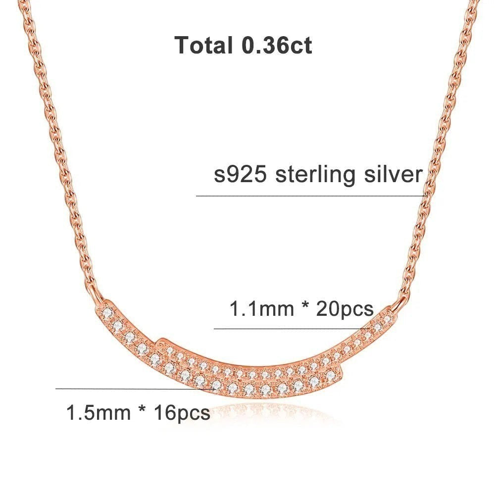 Bee-Bees rose gold plated s925 sterling silver necklace with D VVS1 Moissanite stones in a curved smile pendant design.