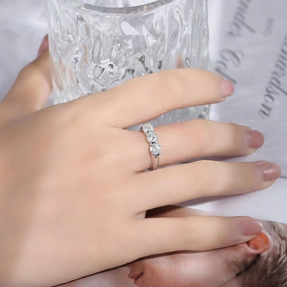 Bee-Bees 5mm round moissanite engagement ring in 925 sterling silver with 18k white gold plating.