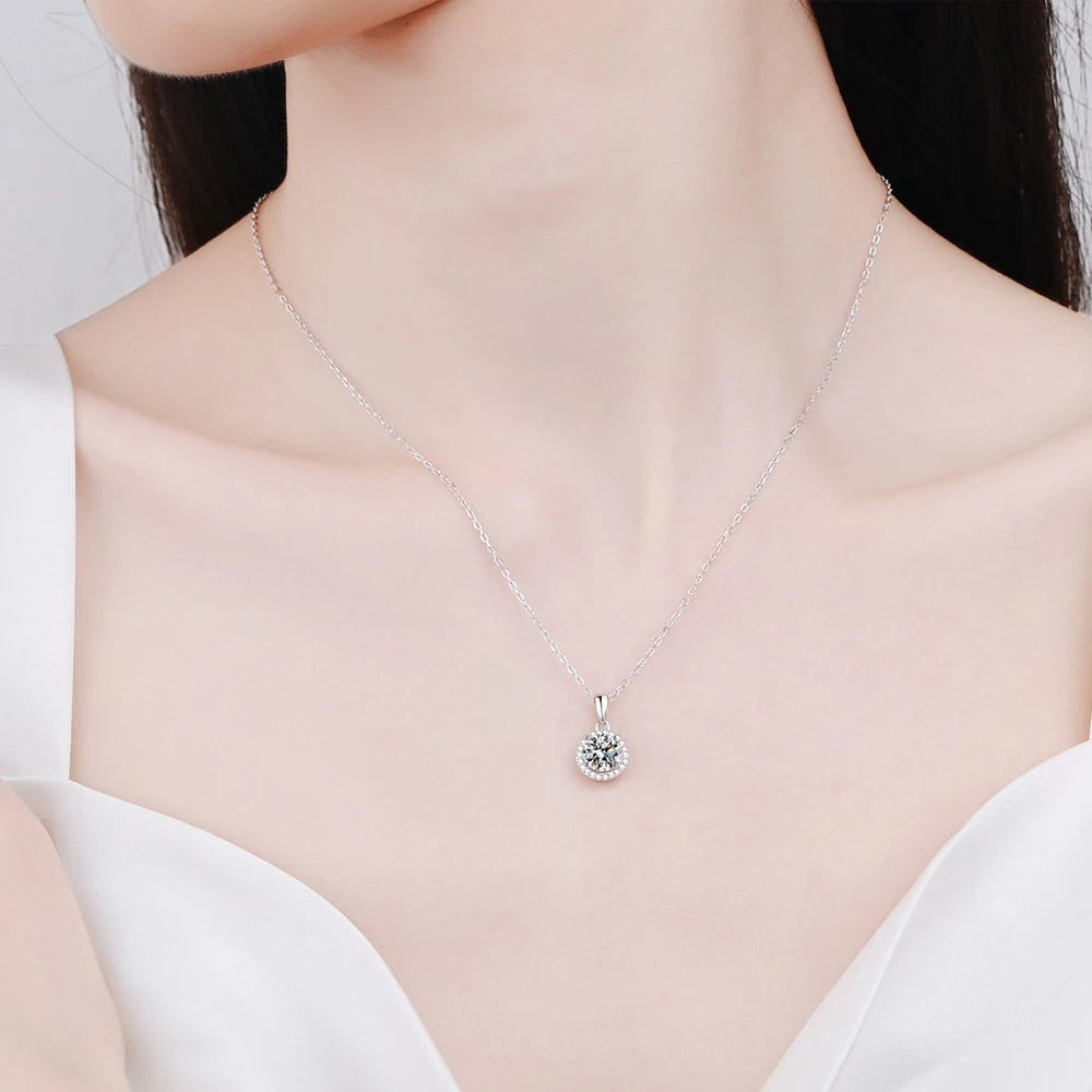 Bee-Bees 1ct round moissanite solitaire necklace in 925 sterling silver with 18k white gold plating. D color, VVS1 clarity.