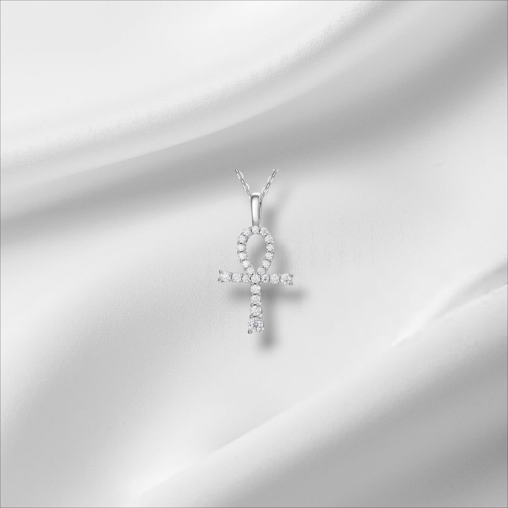 Bee-Bees sterling silver ankh pendant necklace with D Color VVS1 moissanite stones and a rope chain.
