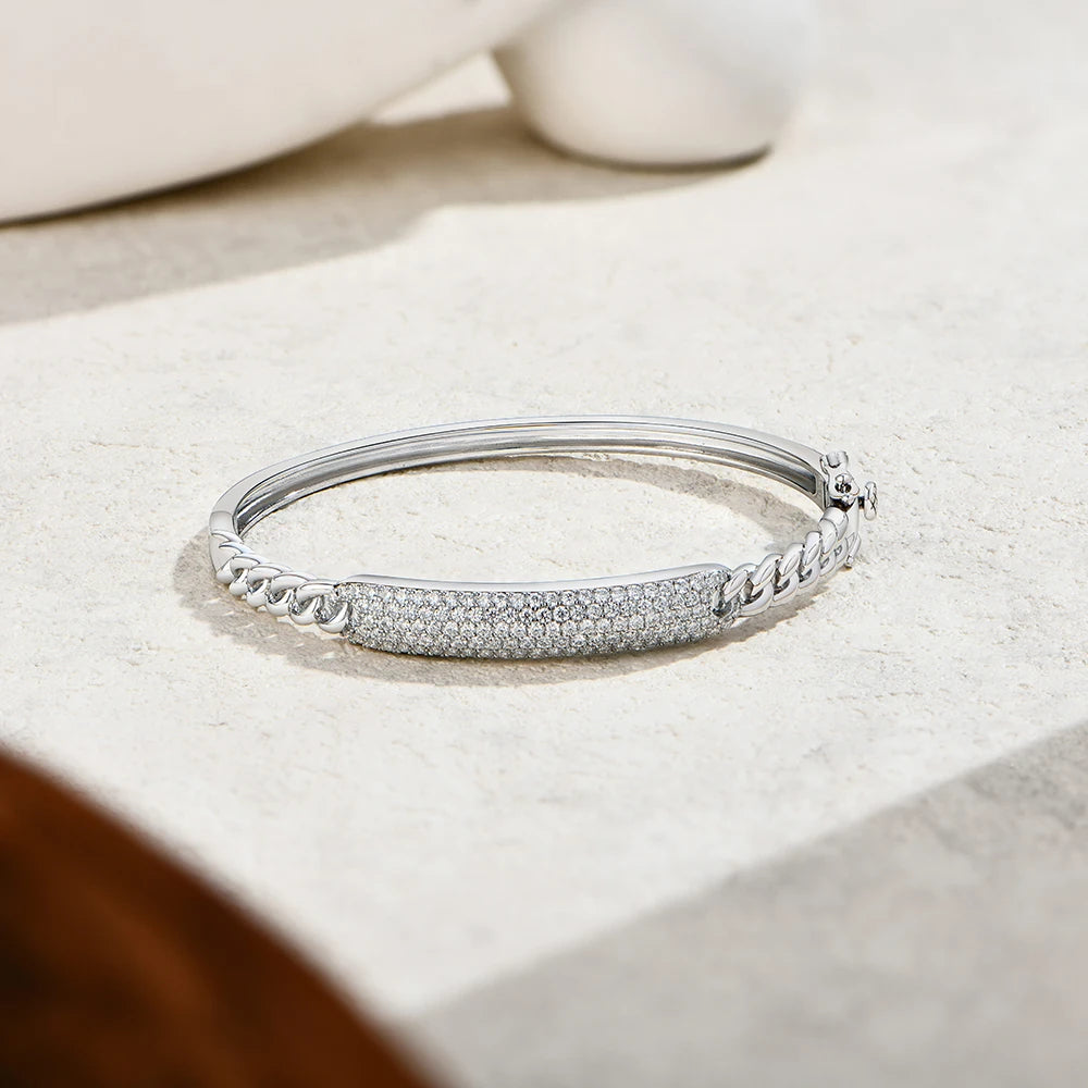 Bee-Bees 925 sterling silver Cuban link bangle featuring a pavé-set moissanite bar with high-polish finish.
