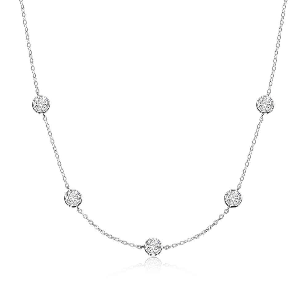 Bee-Bees silver necklace with five round brilliant cut moissanite stones spaced along a delicate chain.