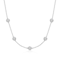 Bee-Bees silver necklace with five round brilliant cut moissanite stones spaced along a delicate chain.