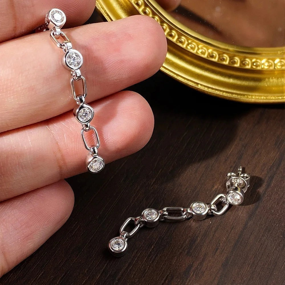 Bee-Bee's dainty sterling silver chain tassel earrings with 3mm moissanite stones, perfect for elegant wear.