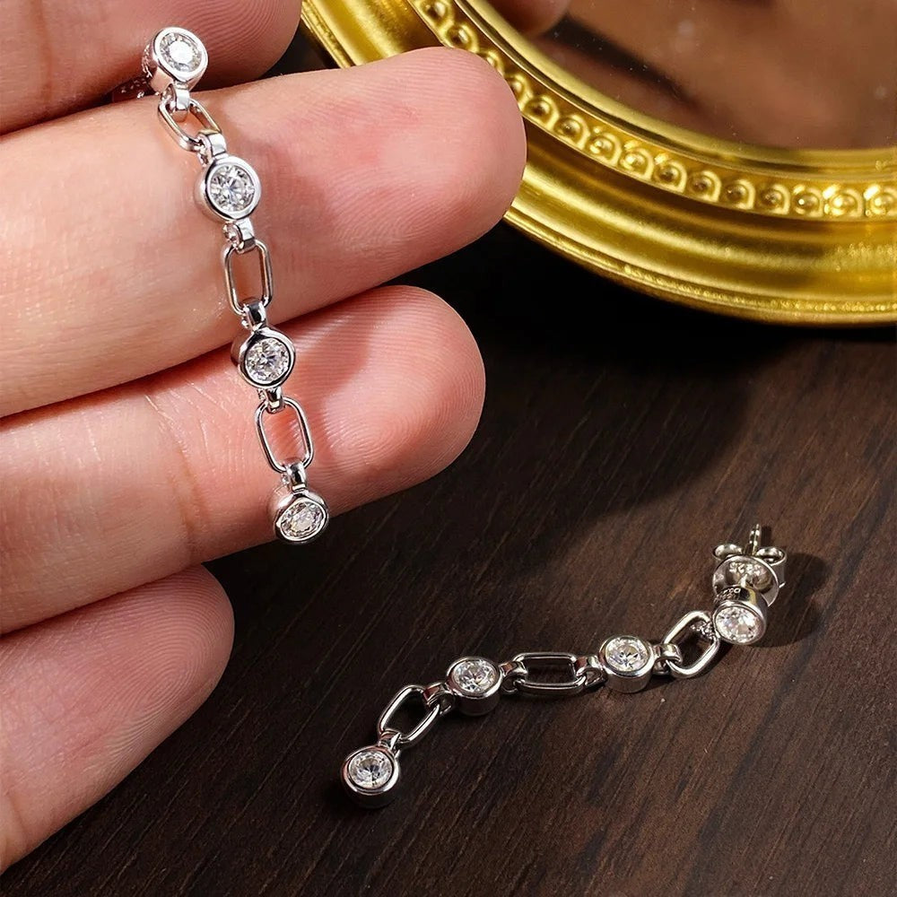 Bee-Bee's dainty sterling silver chain tassel earrings with 3mm moissanite stones, perfect for elegant wear.