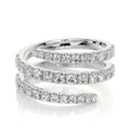 Bee-Bee's Sterling silver spiral eternity band with D VVS1 moissanite stones. Unique flowing design.
