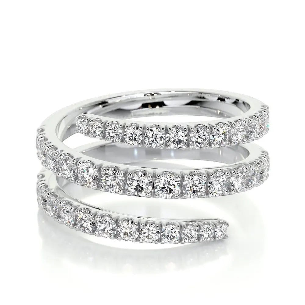 Bee-Bee's Sterling silver spiral eternity band with D VVS1 moissanite stones. Unique flowing design.