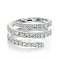Bee-Bee's Sterling silver spiral eternity band with D VVS1 moissanite stones. Unique flowing design.